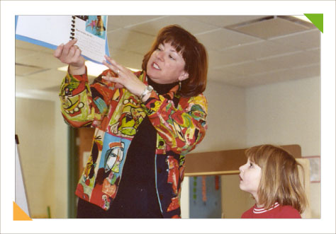 Educational consulting expert Kim Hughes holds the rapt attention of a preschooler